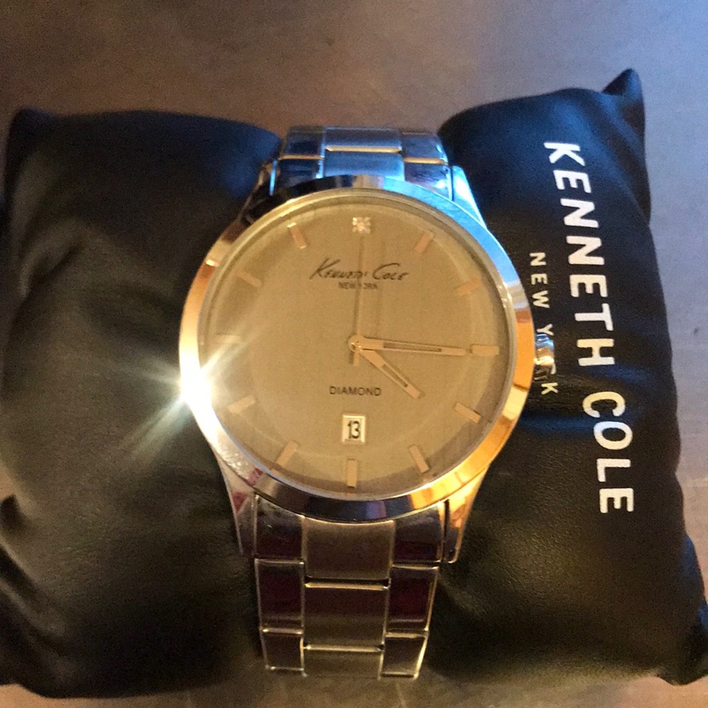 Kenneth Cole stainless steel watch.